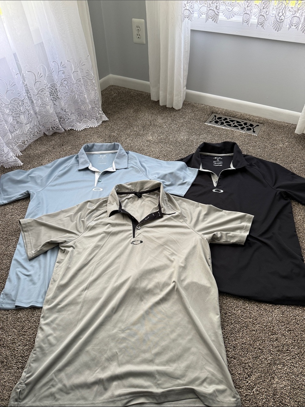 Oakley Men's Polo Trio — Black, Light Blue, and Light Gray